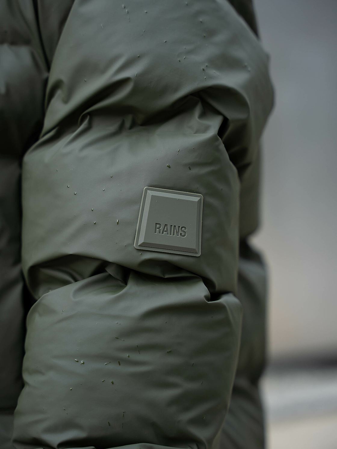 RAINS UNISEX Puffer green parka