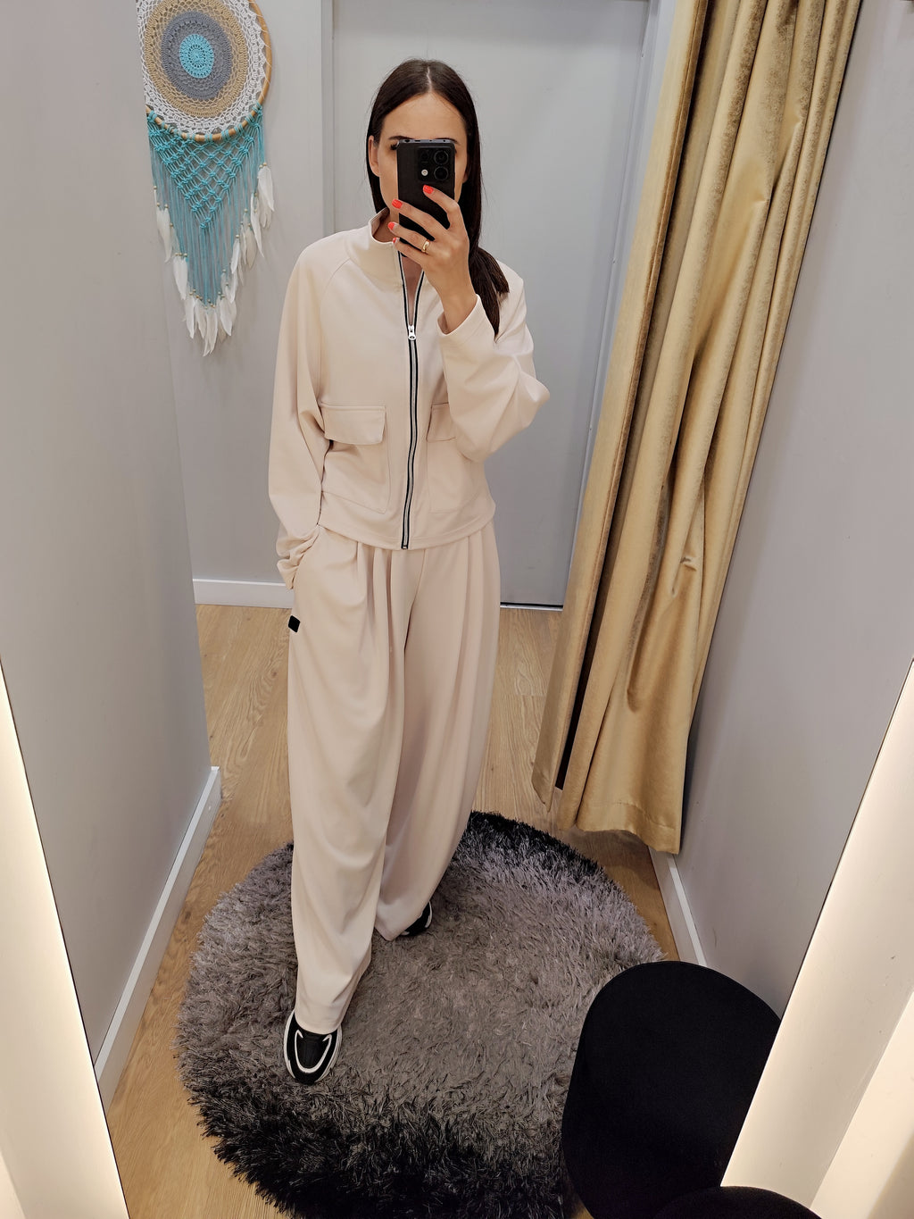 PEPPER Creamy platėjančios kelnės moterims